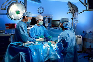 Doctors around operating table