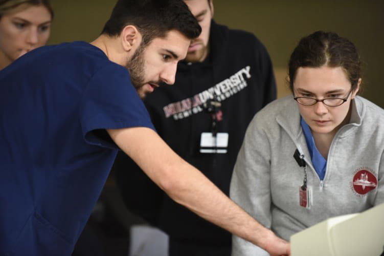 melanie scheive working in the clinic