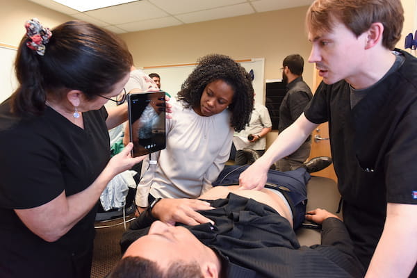 MD students practice ultrasound at Northwest campus