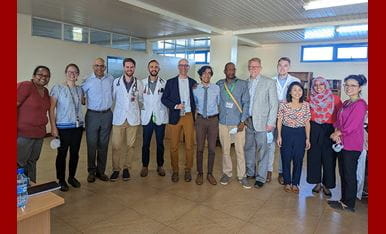 Students, faculty and team leaders take a group photo in Kenya.