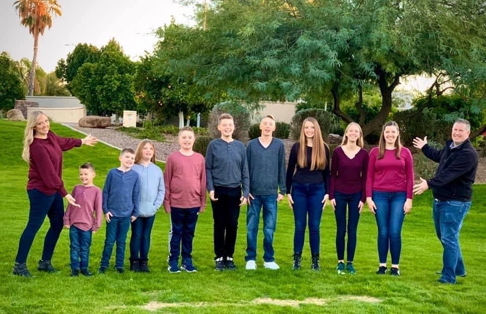 Sarah and Jason Merrill with their nine children