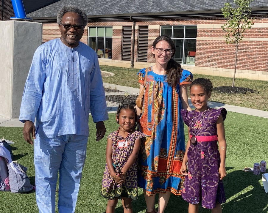 Jennifer Watters with her family at an international festival