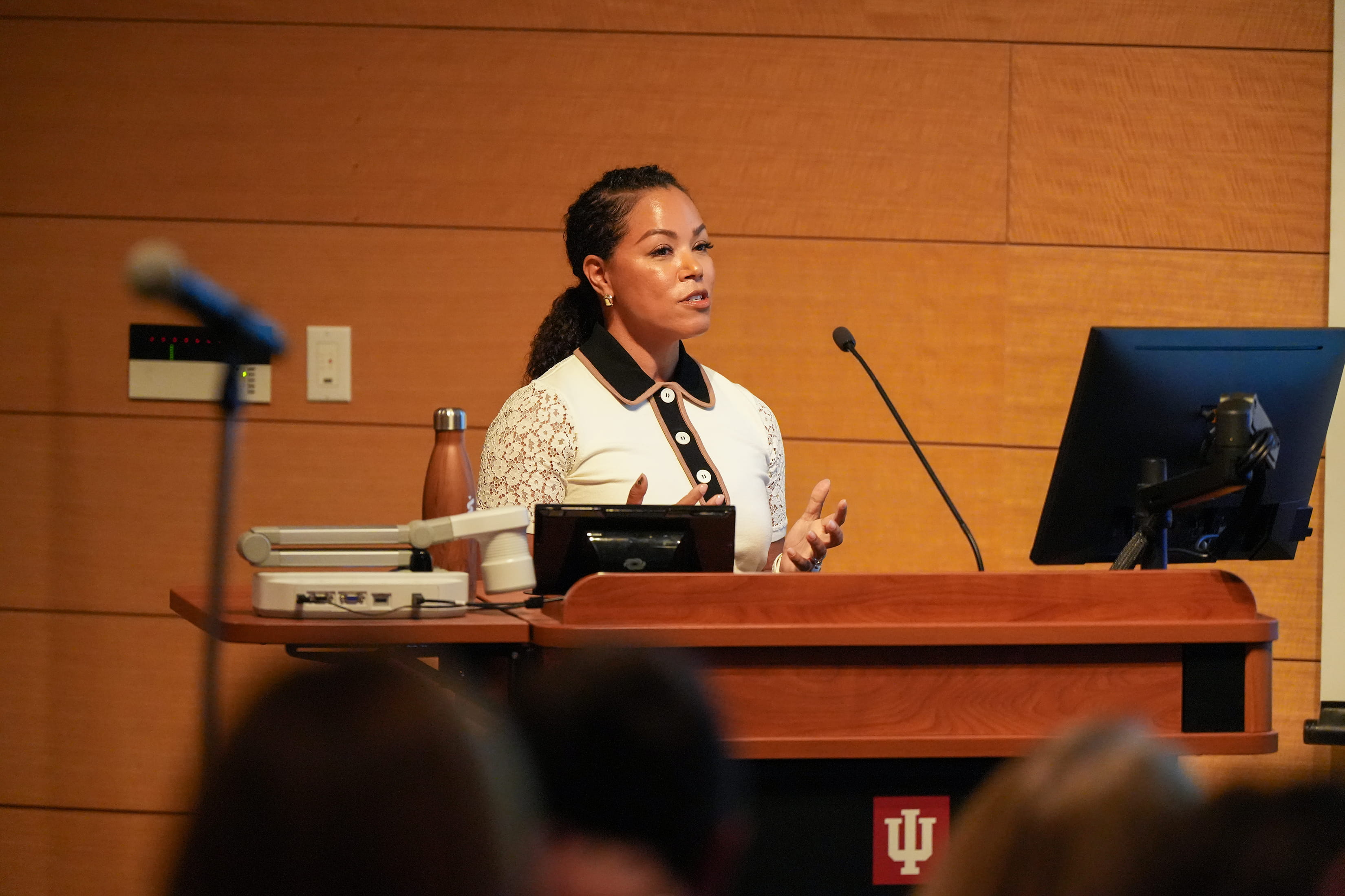 chemen neal speaks at the all school meeting