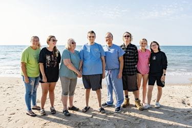 Dr. Gregory Taylor with Devin Loudy and his family at Lake Michigan