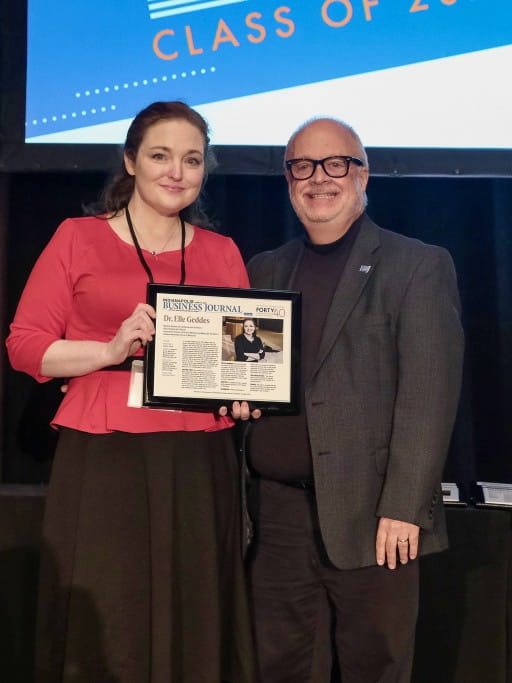 Elle Geddes with IBJ award