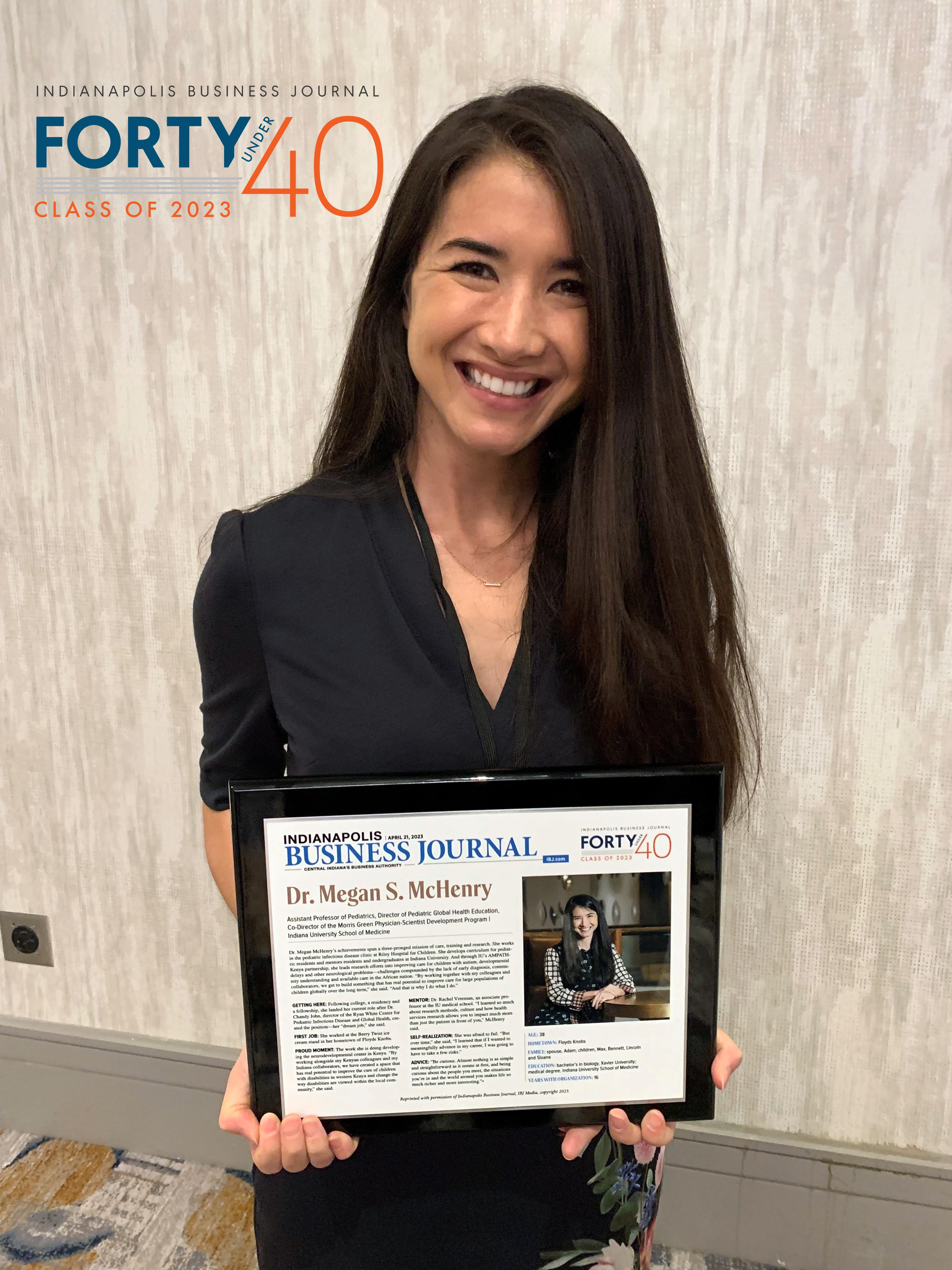 Megan McHenry with her IBJ award