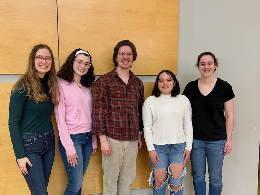 IU School of Medicine Choir officers pose with director Gavin Craig