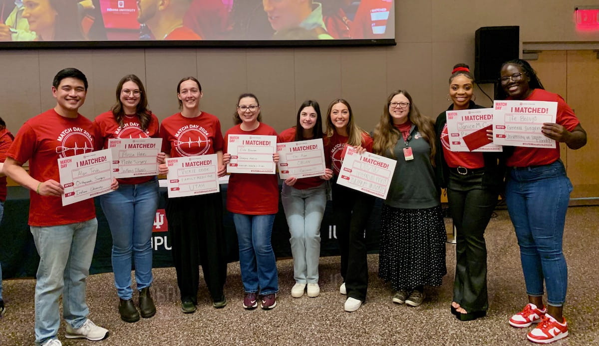 First-gen students display their Match Day signs
