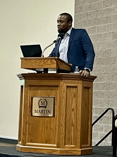 Onyedika Ilonze, MD, speaks at a Martin University health summit