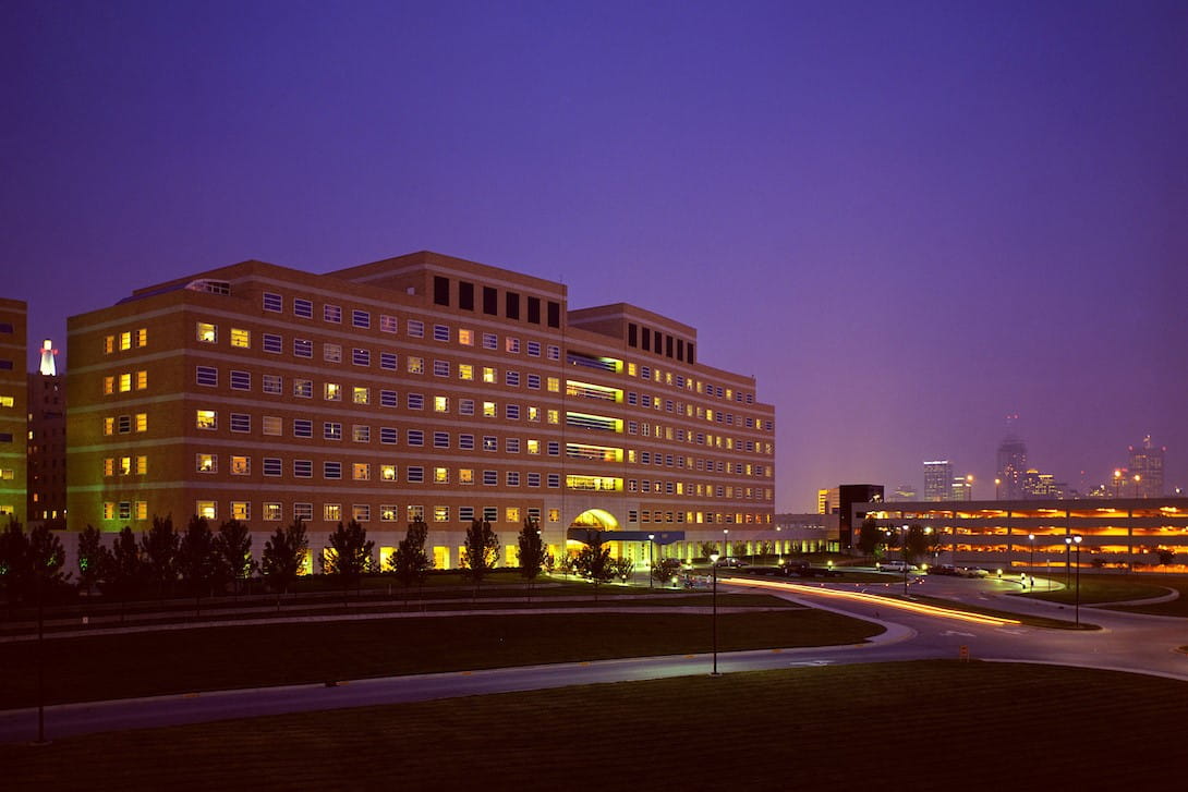 lights inside methodist hospital glow as night falls in indianapolis