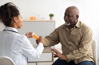 Nurse and African American patient