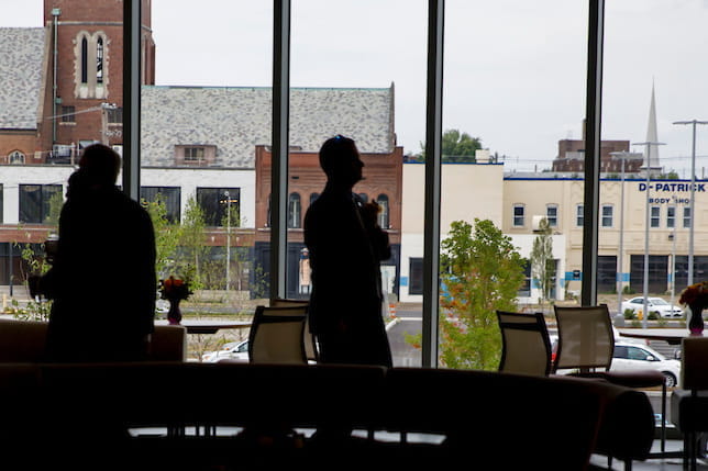a silhouette of a researcher in the stone family center for health sciences