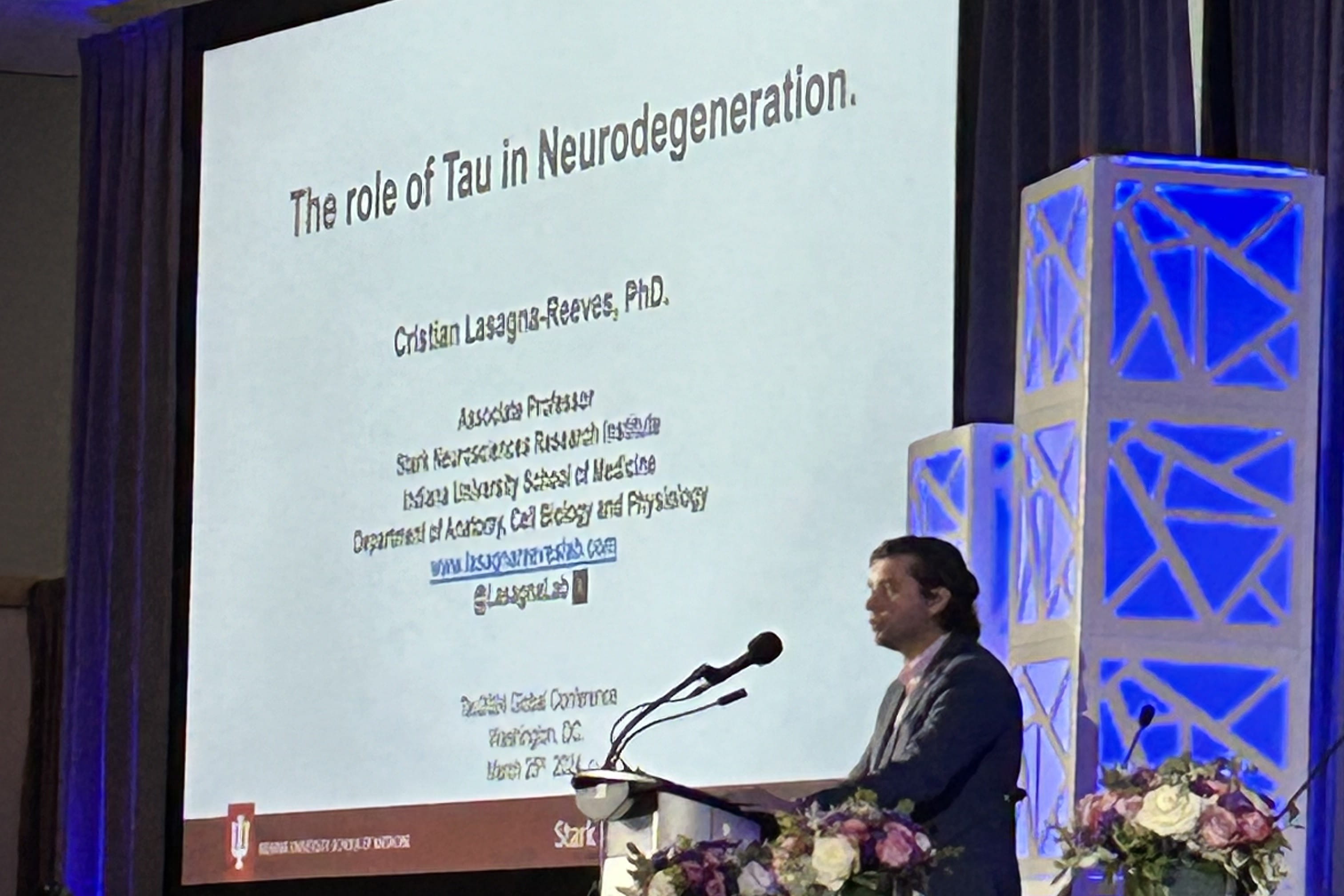 Cristian Lasagna-Reeves presenting at a conference