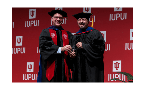 Dr. Reuben Kapur and IUPUI Interim Chancellor Klein at the 2023 IUPUI Chancellor's Academic Honors Convocation.
