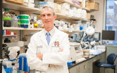 Mark Payne, MD, in his lab