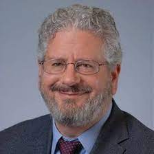 portrait of andy saykin, a white man wearing glasses with gray hair and beard