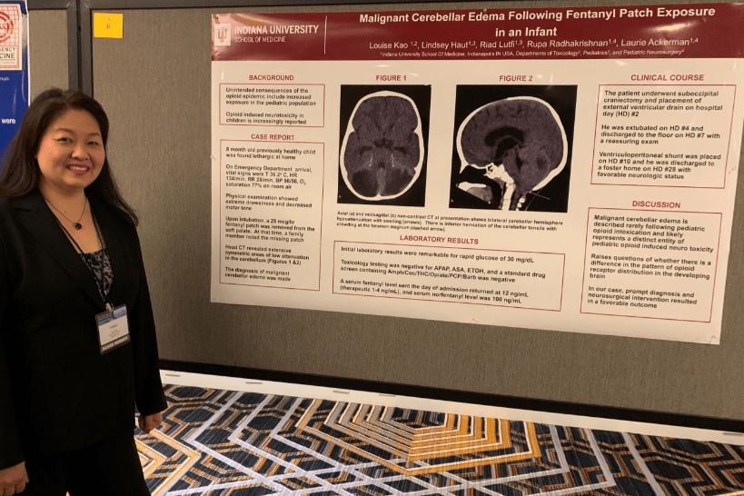 louise kao presenting a poster at a national meeting