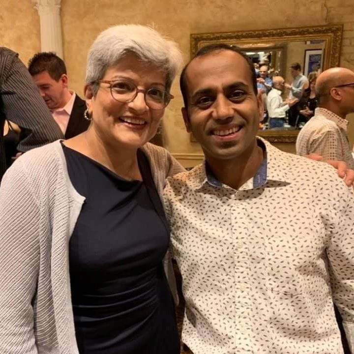 two sleep medicine faculty smile for a photo