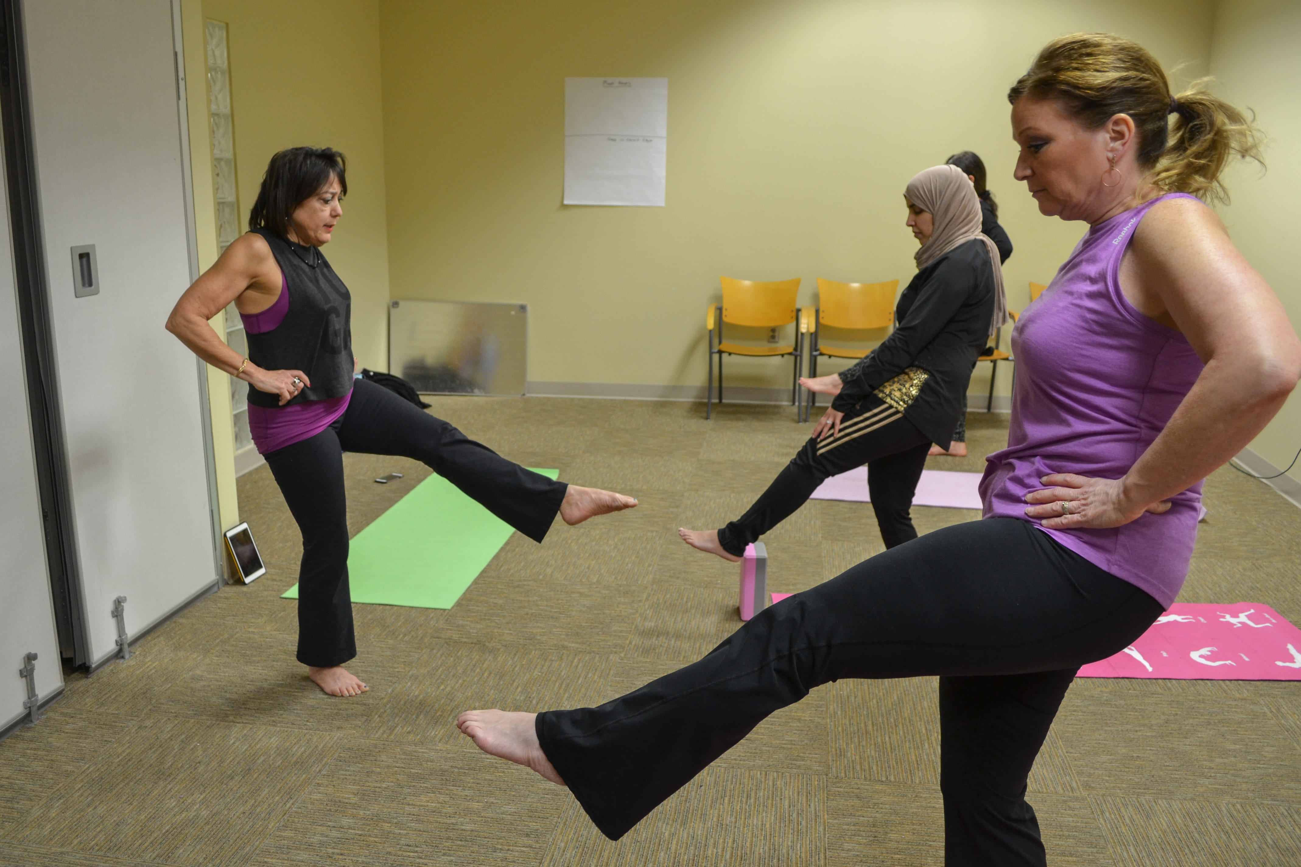 Erica Eugster leads Riley Tuesday morning yoga