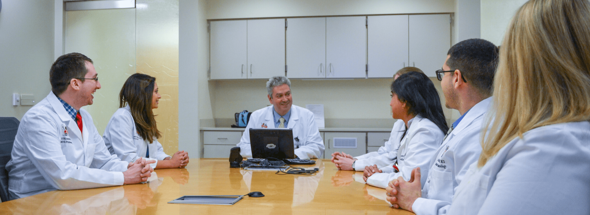 Fellowship Director Angela Delacaris and Associate Fellowship Director Jim Chmiel meet with the Peds Pulmonology fellows