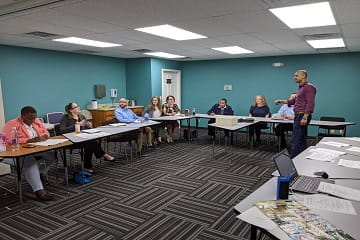 Residents in didactics listening to faculty member