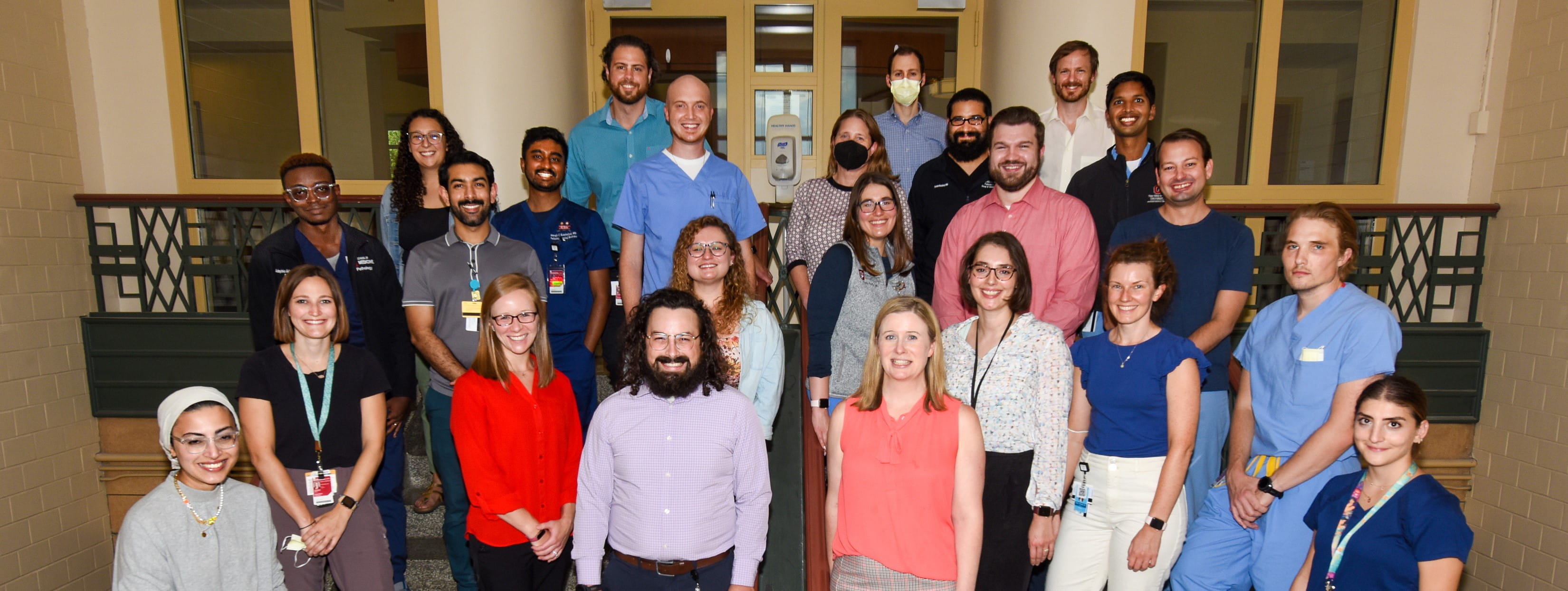 members of the Clinician Educator Training Pathway standing together on a staircase
