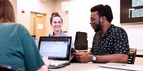 three students work together at the Gary campus