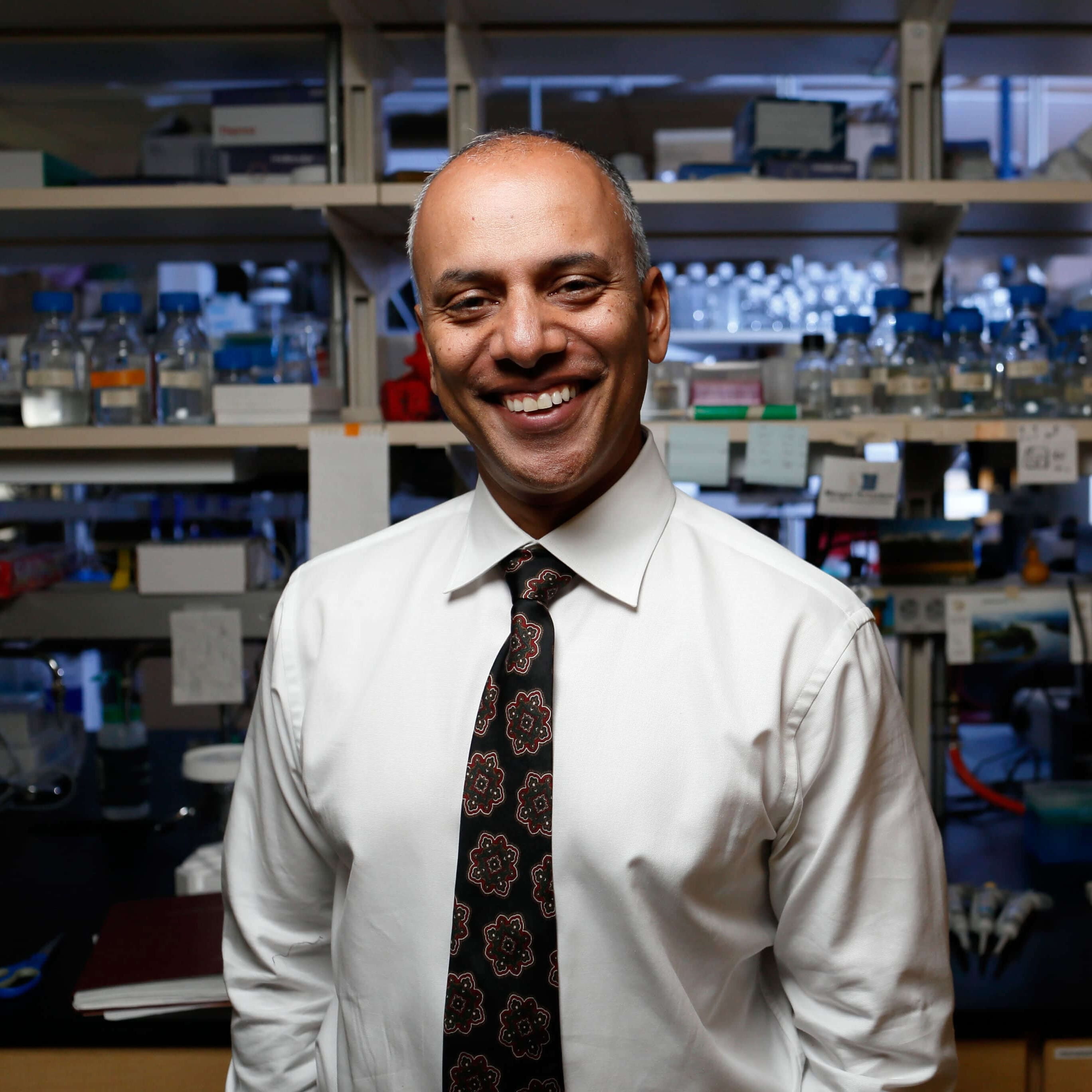 portrait of chandy john in the lab