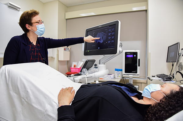 A patient is undergoing an ultrasound at University Hospital