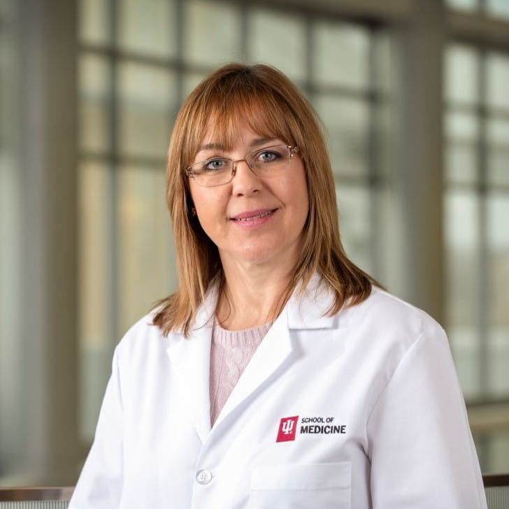 portrait of liana apostolova in a white coat