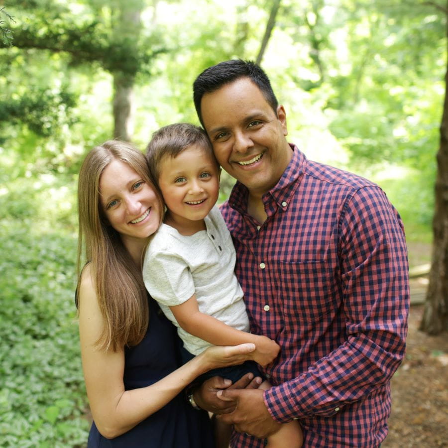a family photo of Rodolfo with his partner and son