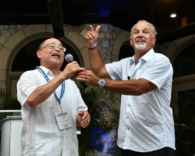 Lee and Pagano speak during the Chuckstrong Backyard Huddle.