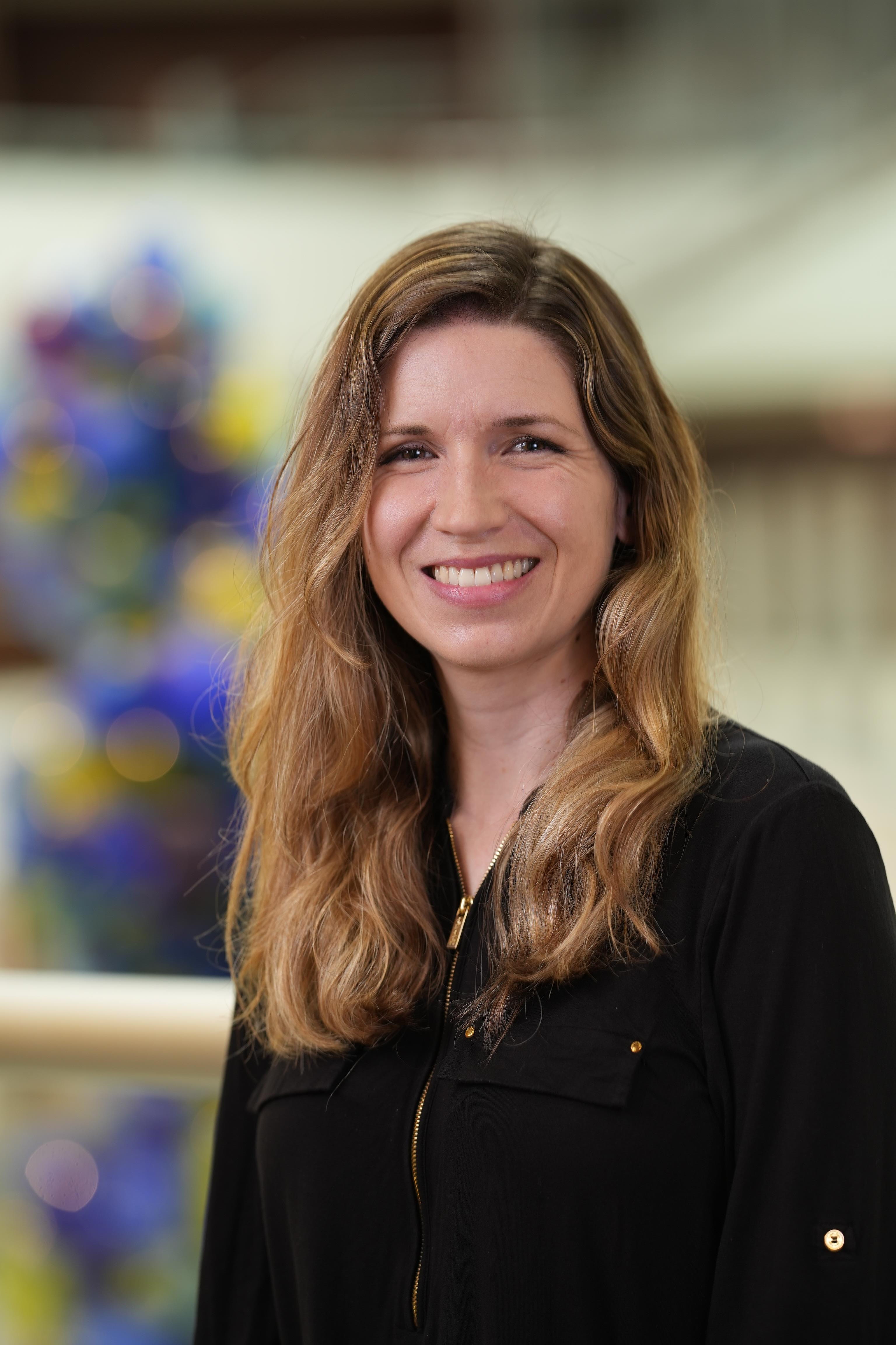 A headshot of Claire Crouse