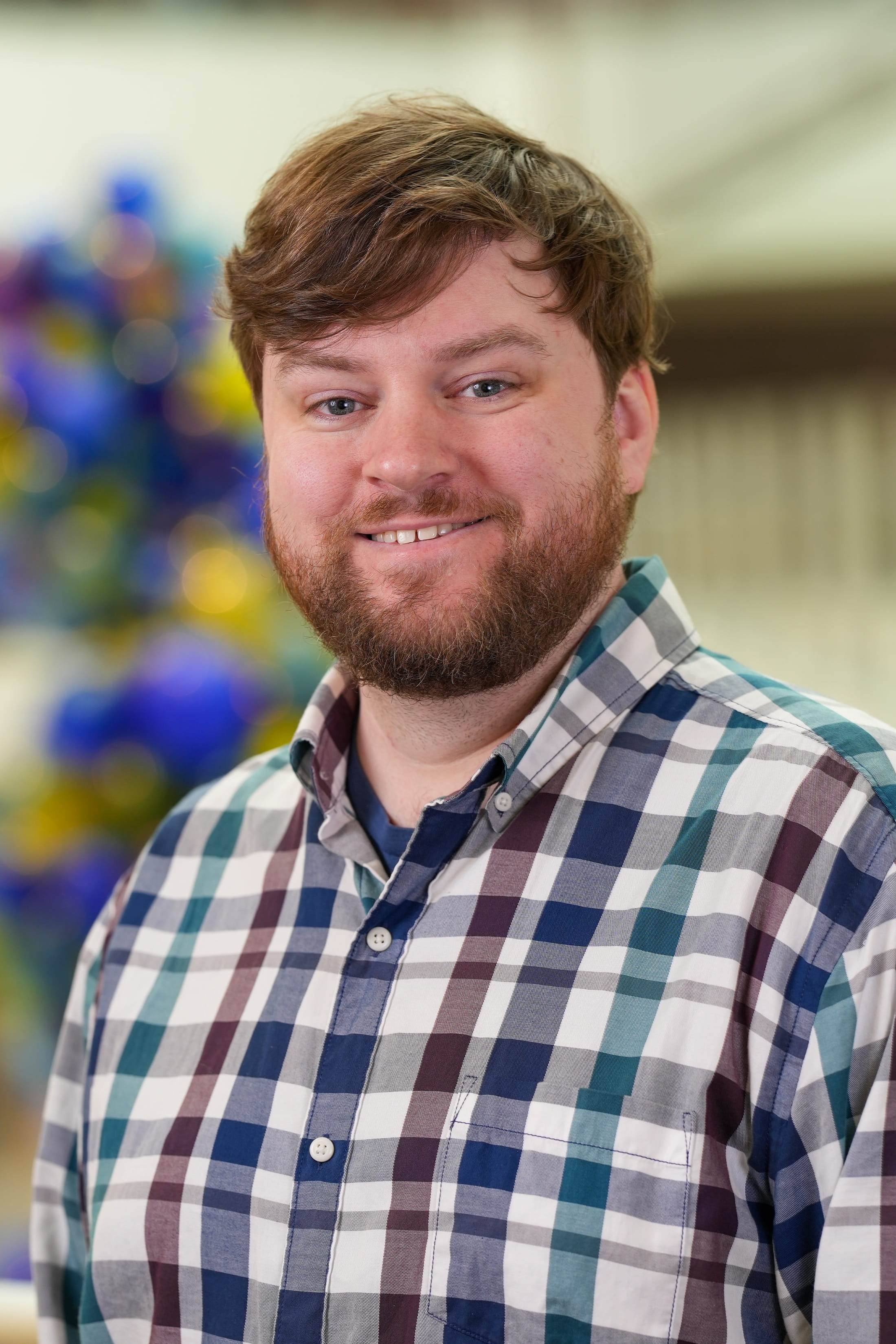 A headshot of Connor Maddern