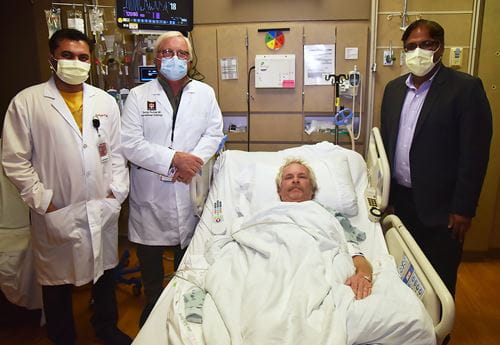 Keyur Vora, MD, MS, George Revtyak, MD, and Rohan Dharmakumar, PhD with the first patient to enroll in a new cardiovascular clinical trial.