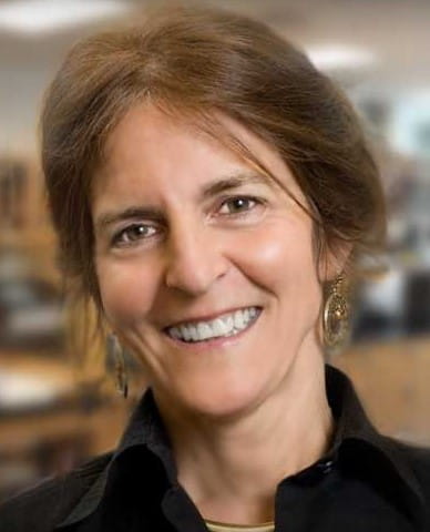 Jean Bennett brown hair smiling 