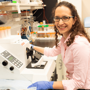 Sarah Burns at a lab station