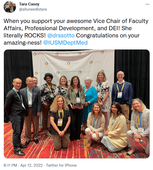 Tweet by Tara Casey: "When you support your awesome Vice Chair for Faculty Affairs, Professional Development, and DEI! She literally ROCKS! @drssotto congratulations on your amazing-ness! @IUSMDeptMed". Photo of Dr. Sotto, center, posing with numerous Dept. of Medicine colleagues. 