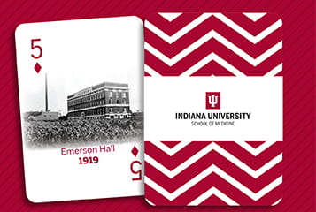 Postcard with IU School of Mediicne logo on one side and Emerson Hall on a 5 of diamonds playing card on the other side 