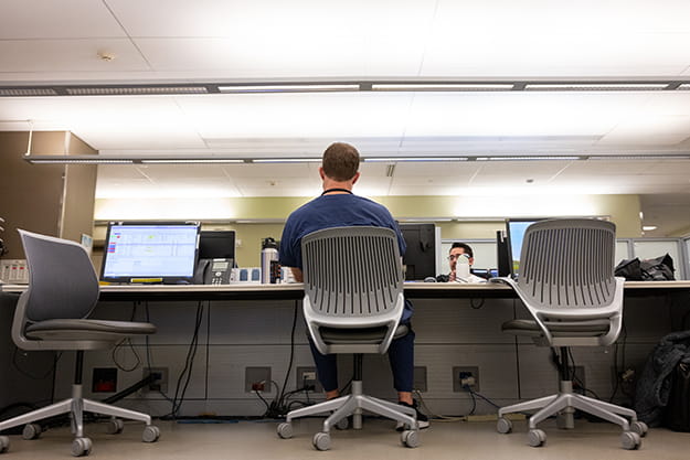 Emergency Medicine residents working on charts