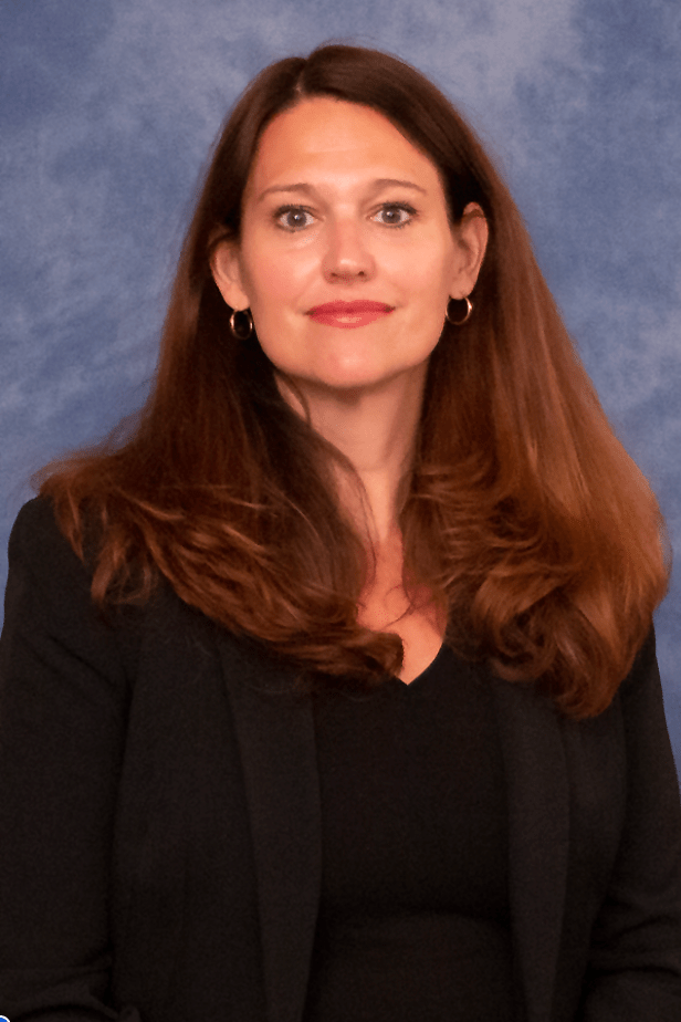 andrea ligler wearing a black shirt with long brown hair