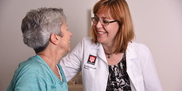 Liana Apostolova with a patient from her research study